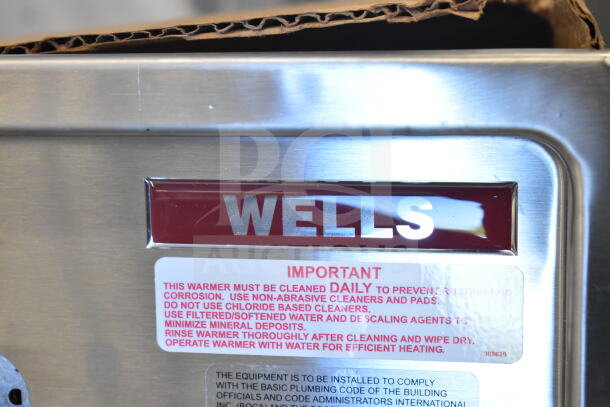 BRAND NEW Wells MOD200TDM, two-compartment drop-in hot food well with thermostatic control, visible label.