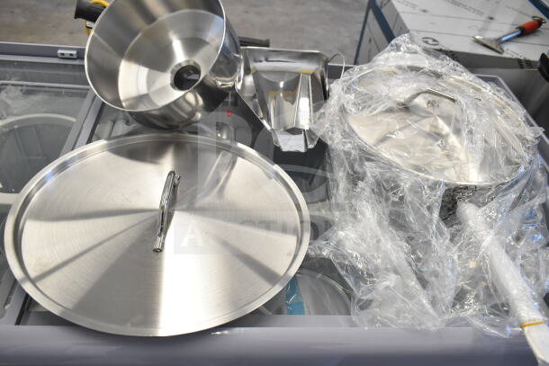 Brand new Vigor SS1 Series 7 Qt. stainless steel saute pan with lid, helper handle, and additional pot lid.