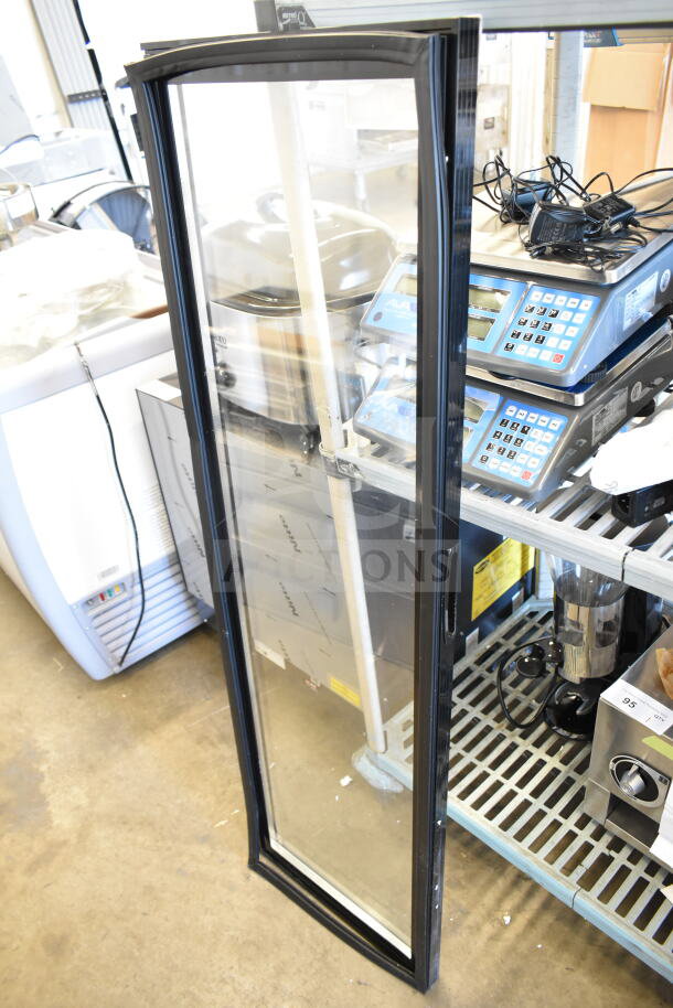 BRAND NEW Galaxy merchandiser door, scratch and dent condition, clear glass panel, black frame, perfect for replacement.
