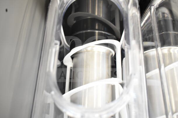 Brand new Stoelting SCBF126-37 double 2.6-gallon pourover frozen beverage machine; clear containers, stainless augers.