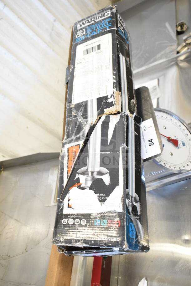 Brand new Waring WSB70ST 21" stainless steel shaft for Big Stix blenders. Box shows visible damage with scratches and dents.