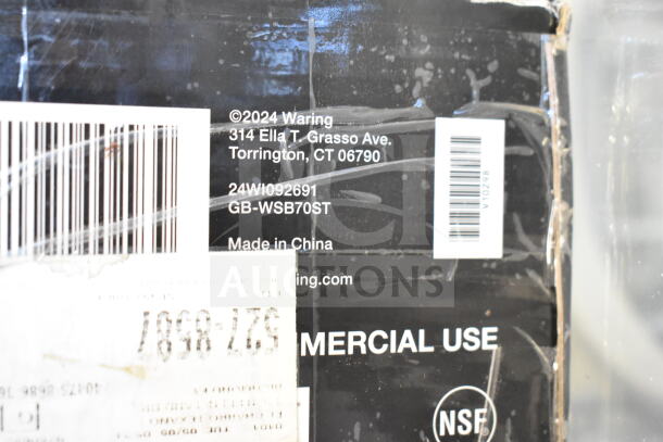 Alt text: Waring WSB70ST 21" stainless steel shaft box for Big Stix immersion blenders. Markings show model, address, and made in China.
