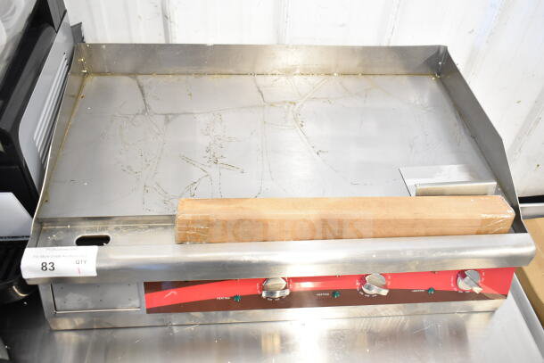Avantco 177EG30N 30" electric countertop griddle. New, with minor scratches and dents. 208/240 volts, three control knobs.
