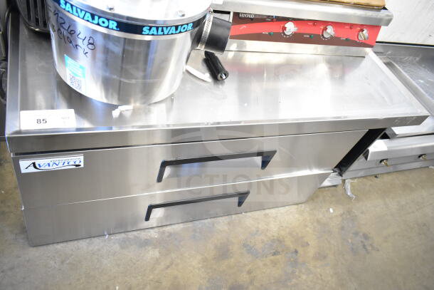 Brand new Avantco 178CBE48HC commercial 2-door chef base, 115 volts, 1 phase, with minor scratches.