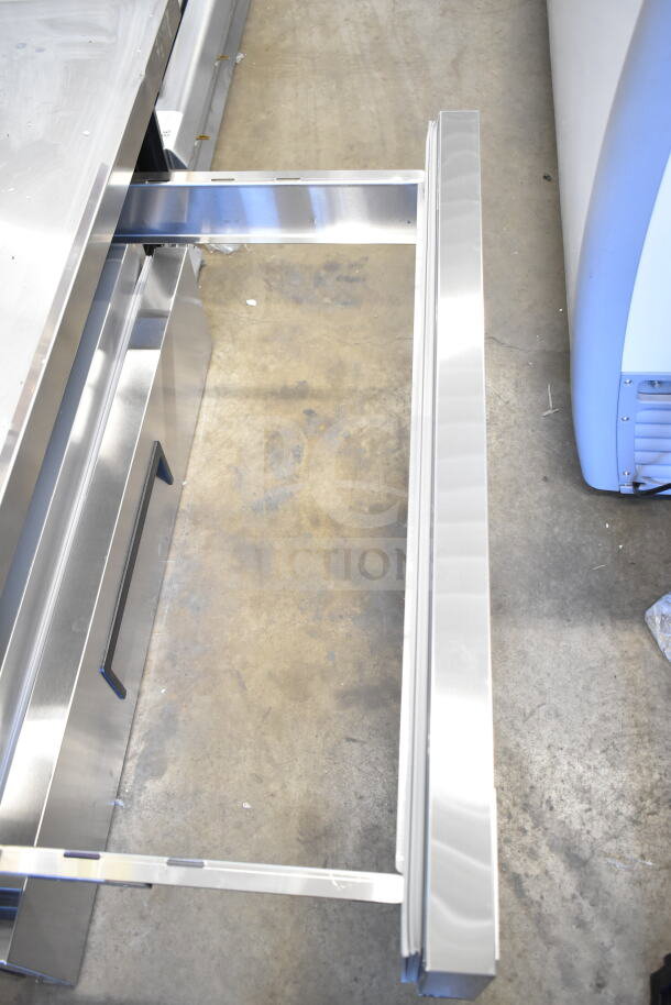 Brand new Avantco 178CBE48HC 2-door chef base with minor scratches. Features stainless steel construction, 115V, 1 Phase.