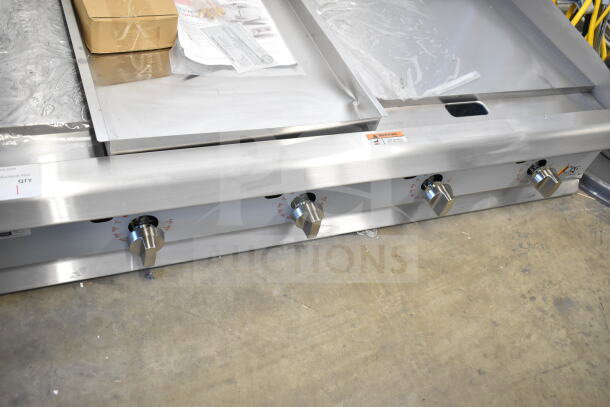 Brand new 2025 Cooking Performance Group 48" natural gas countertop griddle, model 351GTCPG48NL, with thermostatic controls, 120,000 BTU, showing flame failure protection and four control knobs. Scratches visible.