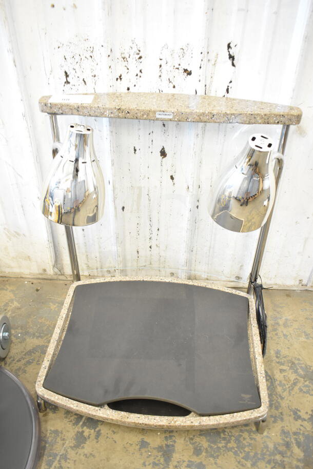 Brand new Vollrath 46670 contoured carving station, 24" x 22" x 27", with chrome lamps, minor scratches, caution label visible.