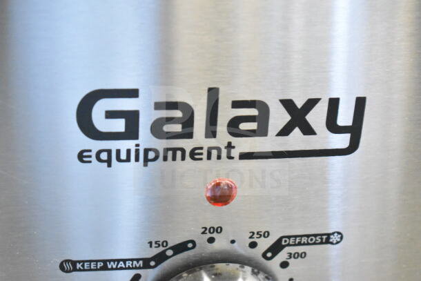 Galaxy 177ACR22SS 22 Qt. Countertop Roaster Oven, brand new with scratch and dent, stainless steel, temperature dial shown.