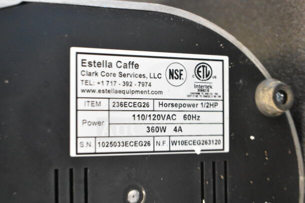 BRAND NEW Estella 236ECEG26 Espresso Bean Grinder, 120V, 1 Phase. Label shows broken hopper, 1/2 HP, 360W, 4A.