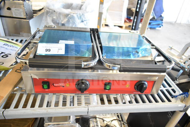 Brand new Avantco 177PG400S commercial panini grill with dual smooth plates, 19 5/8" x 9 1/8" cooking surface, 120V.