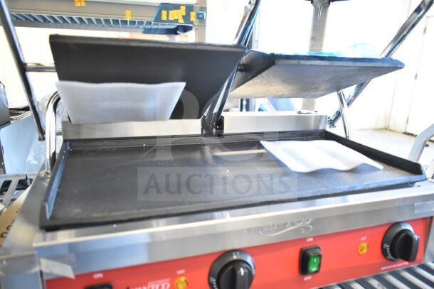 "Brand new Avantco 177PG400S dual panini grill with smooth plates, 19 5/8" x 9 1/8" cooking surface, 120V, 1 phase."