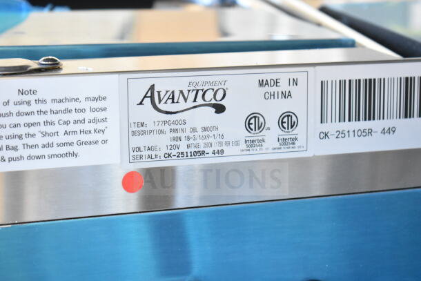 Brand new Avantco 177PG400S Dual Panini Grill, smooth plates, 19 5/8" x 9 1/8" cooking surface, 120V, scratch and dent.