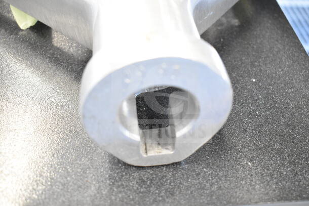 Three new scratch and dent items: Vigor 473SSPOT6 stock pot, door handle, Vollrath 40776 beater, visible steel component.