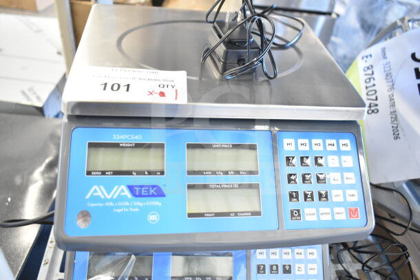 Brand new AvaTek 334PCS40 digital price computing scale, 40 lb capacity, labeled "Legal for Trade," shown with display and keypad.