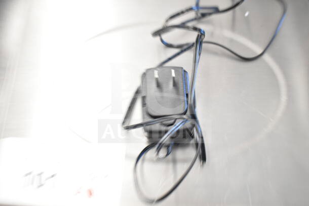 AvaTek 334PCS40 40 lb. digital price computing scale charger, new with minor cosmetic flaws, black with tangled cord.