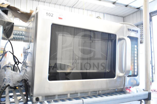 Brand new Solwave 180MW2100TH microwave, 2,100W, stackable, 1.2 cu. ft. interior, push button controls, slight exterior scuffs.