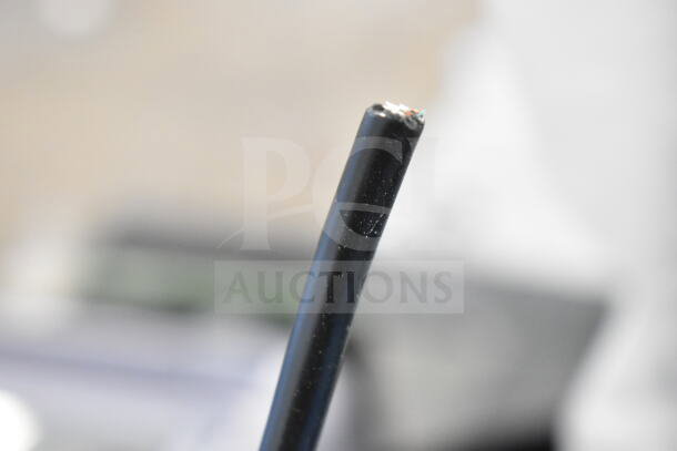 Close-up of a black power cord tip for the Lavex 605WS30B Zap N Trap Insect Light Trap.