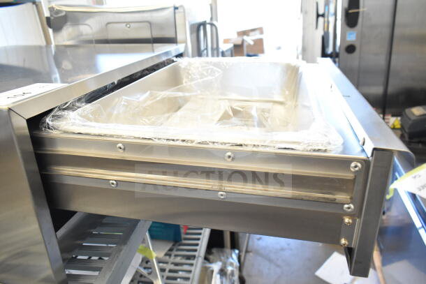 Brand new Avantco 177BW32 stainless steel 32 bun warmer, 120 volts, 1 phase, with scratch and dent imperfections.