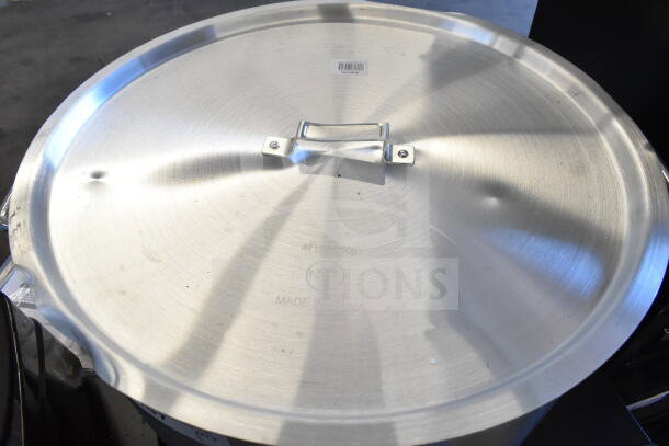 BRAND NEW SCRATCH AND DENT! Choice 471SAP60QT 60 Qt. Aluminum Sauce Pot, minor dents visible, labeled "Made in China".