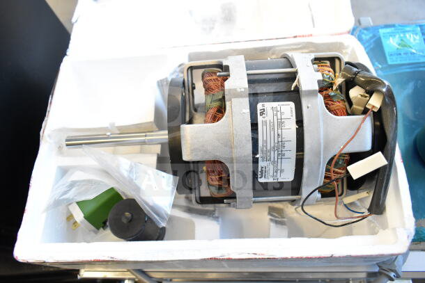Brand new Nidec Motor, 120V, 1 phase, slight scratches, in packaging. Visible label detailing specs and part numbers.
