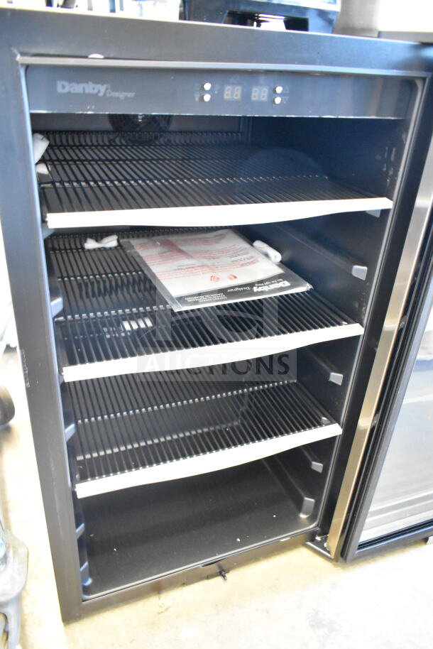 Danby DBC434A1BSSDD 4.3 Cu. Ft. stainless steel beverage refrigerator, glass door, towel bar handle, new condition.