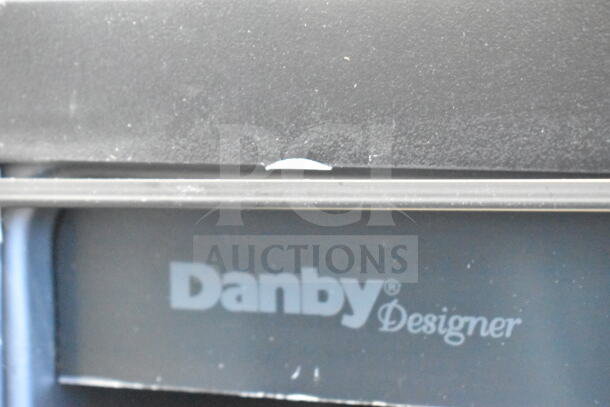 Danby DBC434A1BSSDD 4.3 Cu. Ft. beverage refrigerator, stainless steel, glass door, towel bar handle, visible defect.