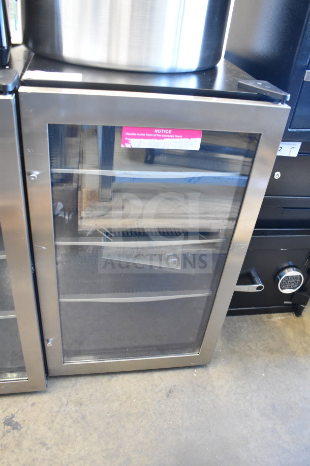 Danby DBC434A1BSSDD 4.3 cu. ft. beverage refrigerator, stainless steel, glass door, towel bar handle, new, minor scratches.