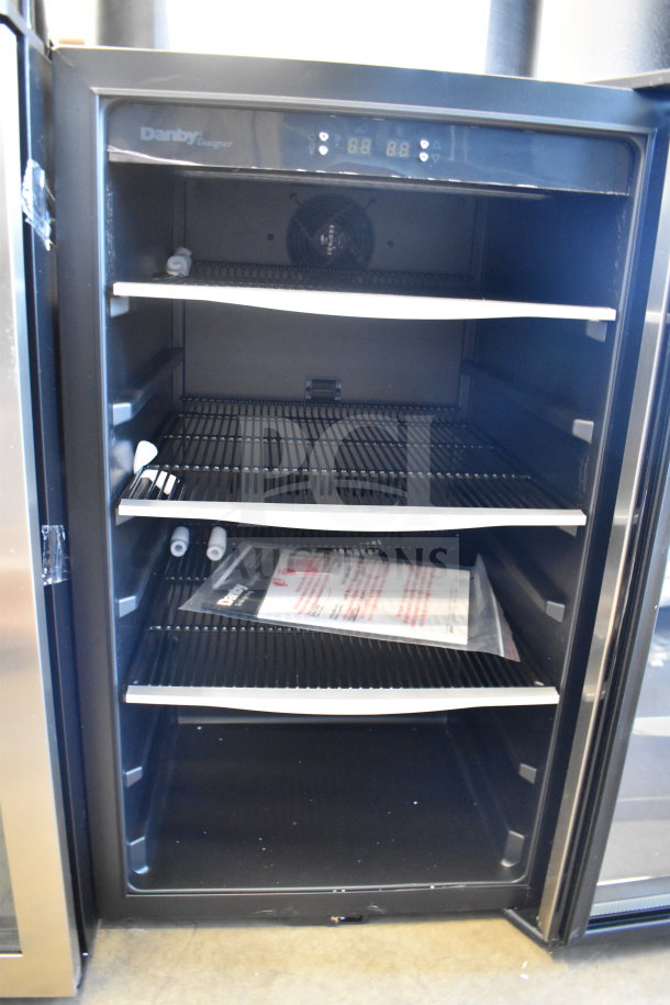 Brand new Danby DBC434A1BSSDD 4.3 Cu. Ft. stainless steel beverage refrigerator with glass door, scratch and dent condition.