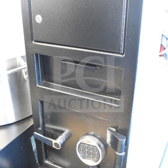 Black steel depository safe by 360 Office Furniture, 14" x 14" x 27.25", with electronic keypad and top locker. New, scratch and dent condition.