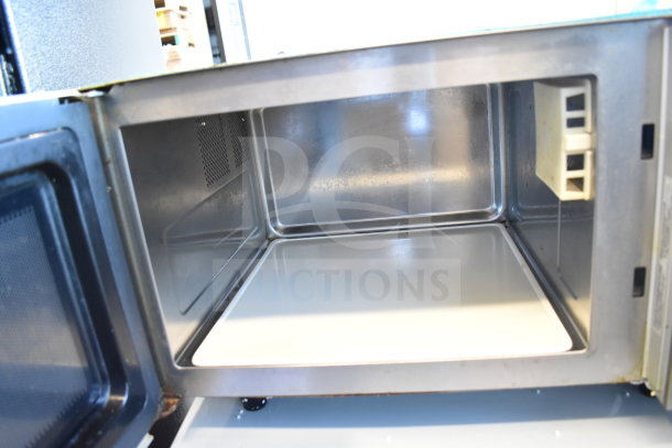 Brand new Solwave 180MW1000SS commercial microwave, 2024 model, with scratch and dent. Interior view, stainless steel.