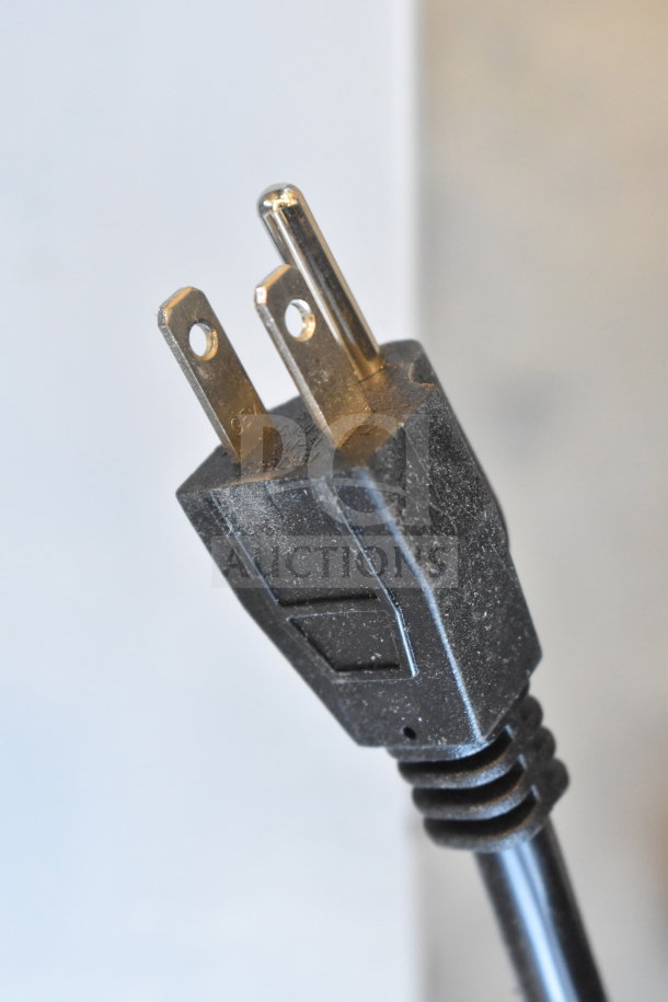 Close-up of a power plug for the Avantco 194MCH430A ice machine. Black, three-prong, 115 Volts.