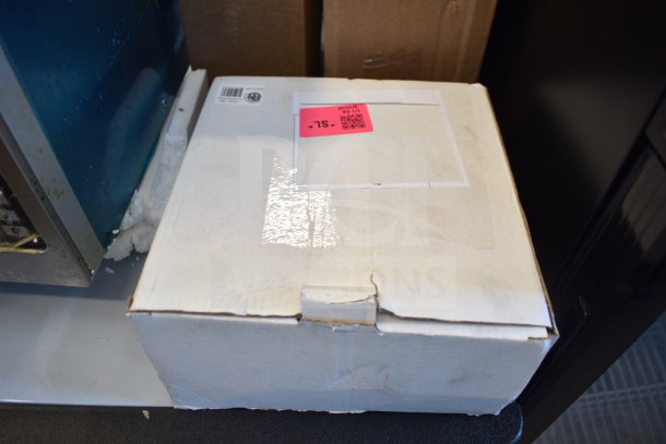 Box containing 6 brand new scratch and dent items, including Adcraft Hi Limit and Avantco feed chute pusher.