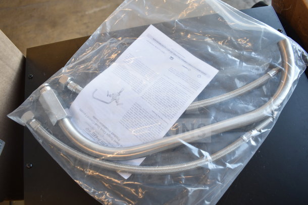 Brand new Fisher 63592 Single Deck Mount Faucet Base with control valves, swivel stems, and lever handles in packaging.
