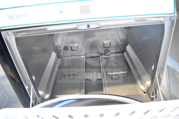 Brand new Noble 495LTUC24 low-temperature undercounter dishwasher interior; commercial grade, 120V, 1 Phase, minor dents.