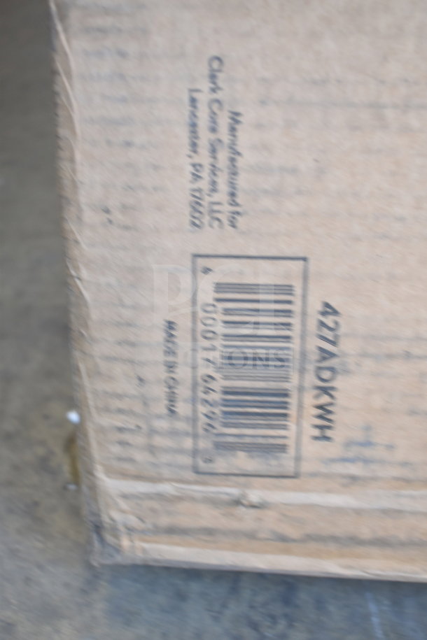 Cardboard box showing label for Lancaster Table & Seating White Adirondack Chair, model 427ADKWH, marked "Made in China."