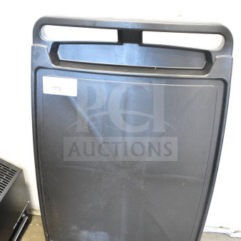 BRAND NEW SCRATCH AND DENT Metro Top Shelf for Cart; black, some visible scratches, durable material, handle slots.