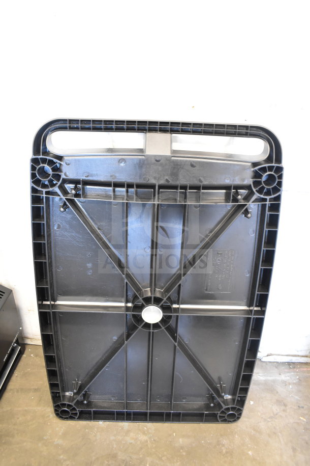 BRAND NEW Metro top shelf for cart, black, plastic, slight scratches and dents visible. Sturdy grid structure.