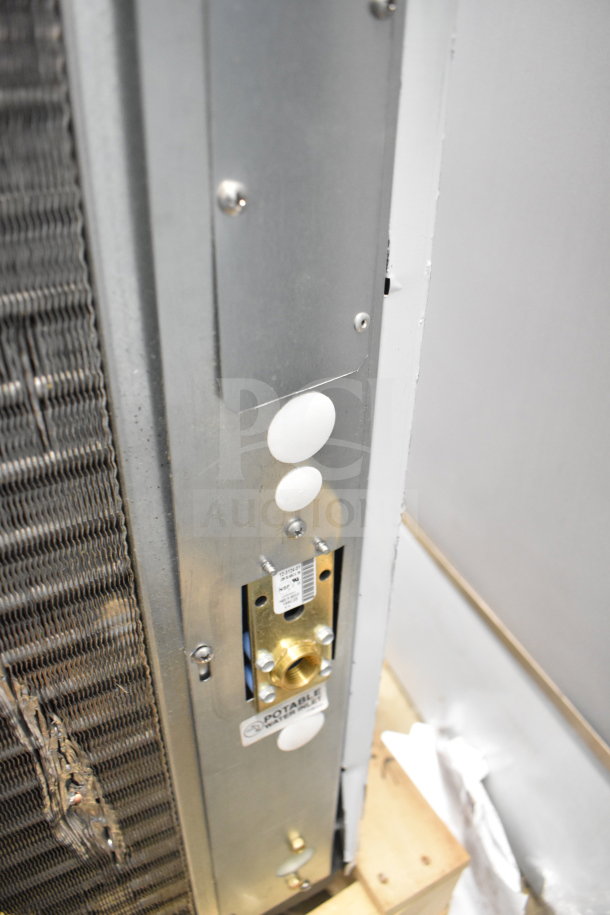 BRAND NEW SCRATCH AND DENT! Scotsman MC0330MAX-1A Prodigy Elite Ice Machine, showing side and plumbing connections.