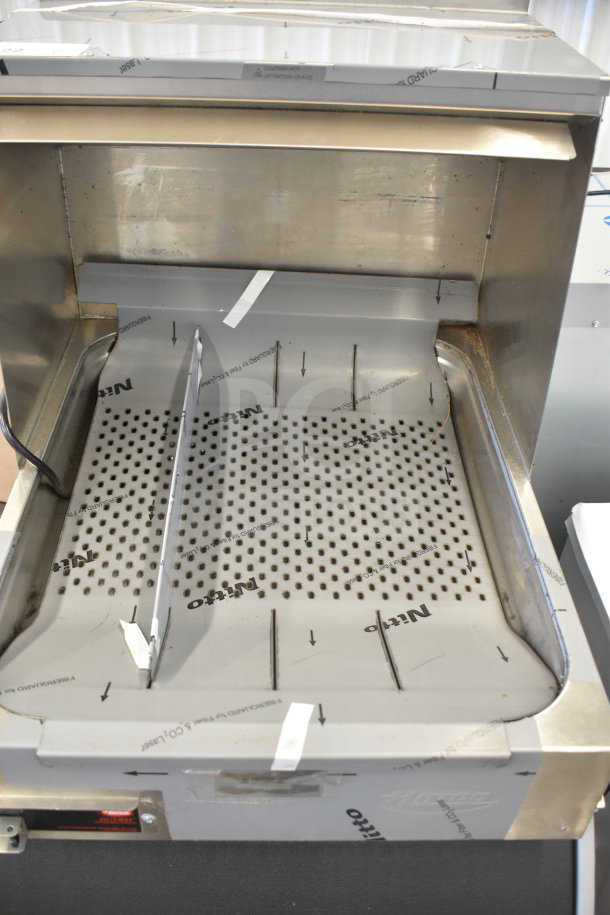 Brand new Hatco GRFHS-21 Glo-Ray 21" fry holding station. Scratch and dent. 120 Volts, 1 Phase. Protective coverings visible.