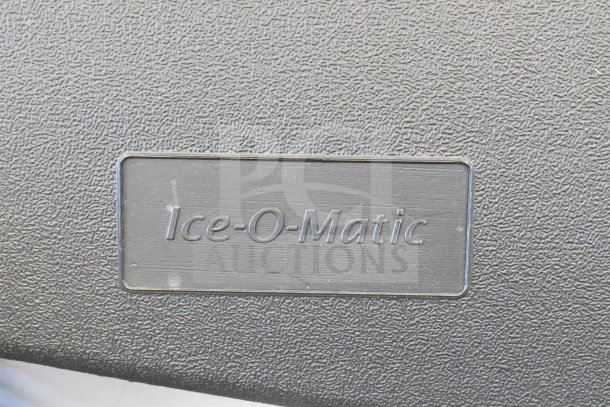 Ice-O-Matic ICEU220FA5 logo on a textured surface. Appears on a new undercounter ice machine with 70 lb. bin.