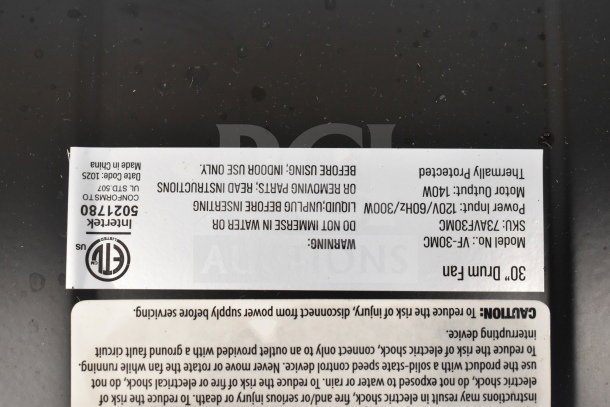 BRAND NEW SCRATCH AND DENT Boltic 73AVF30MC 30" 3-speed drum fan, black powder-coat, 9,250 CFM, 120V, 1 phase, 2/5 hp. Warning label features instructions and electrical specifications.