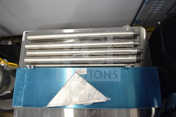 Brand new 2025 Avantco 177STE2S electric steam table, two-pan capacity, with undershelf, shown with packaging materials.