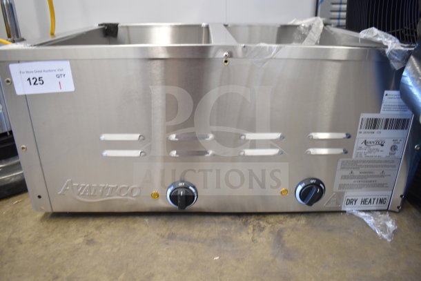 Brand new Avantco 177STE2S electric steam table, stainless steel, with two pan capacity, undershelf, and dry heating label.