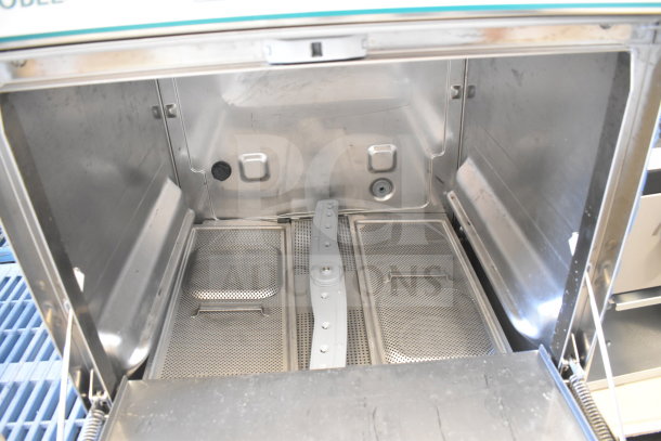 Brand new Noble 495LTUC24 low-temp undercounter dishwasher with slight cosmetic dents. 2025 model, 120V, 1 phase. Interior view.