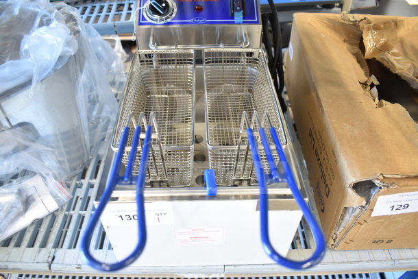 BRAND NEW Globe Chefmate PF10E 10 lb. electric countertop fryer, 120V, dual baskets, scratch and dent condition.
