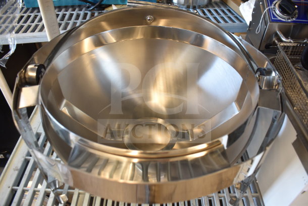 "Brand new round chafer dish, stainless steel, minor scratches and dents, reflective finish, ideal for catering use."