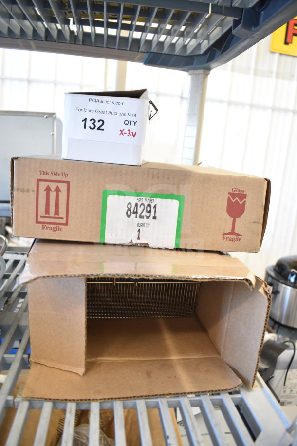 Three new items: Perfect Fry 84291 air filter kit and Blodgett 8281 basket. Boxes labeled fragile, part number visible.
