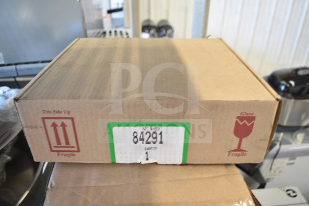 Box labeled "84291" containing Perfect Fry Air Filter Kit for ventless deep fryers, brand new, fragile, with "This Side Up" markings.