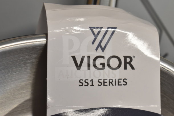 Vigor SS1 Series stainless steel fry pan with label, includes 473SSFRY9 (9½") and 473SSFRY16 (16") models, new condition.