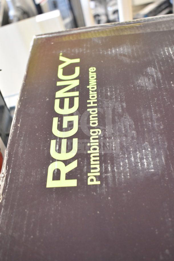 Box with Regency pre-rinse faucet; 1.15 GPM, 8" centers, 44" hose. Label indicates new, scratch and dent condition.